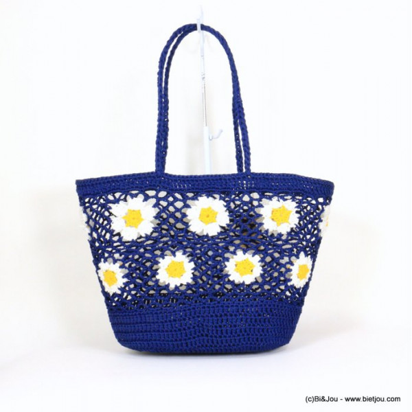 Panier avec fleurs marguerites